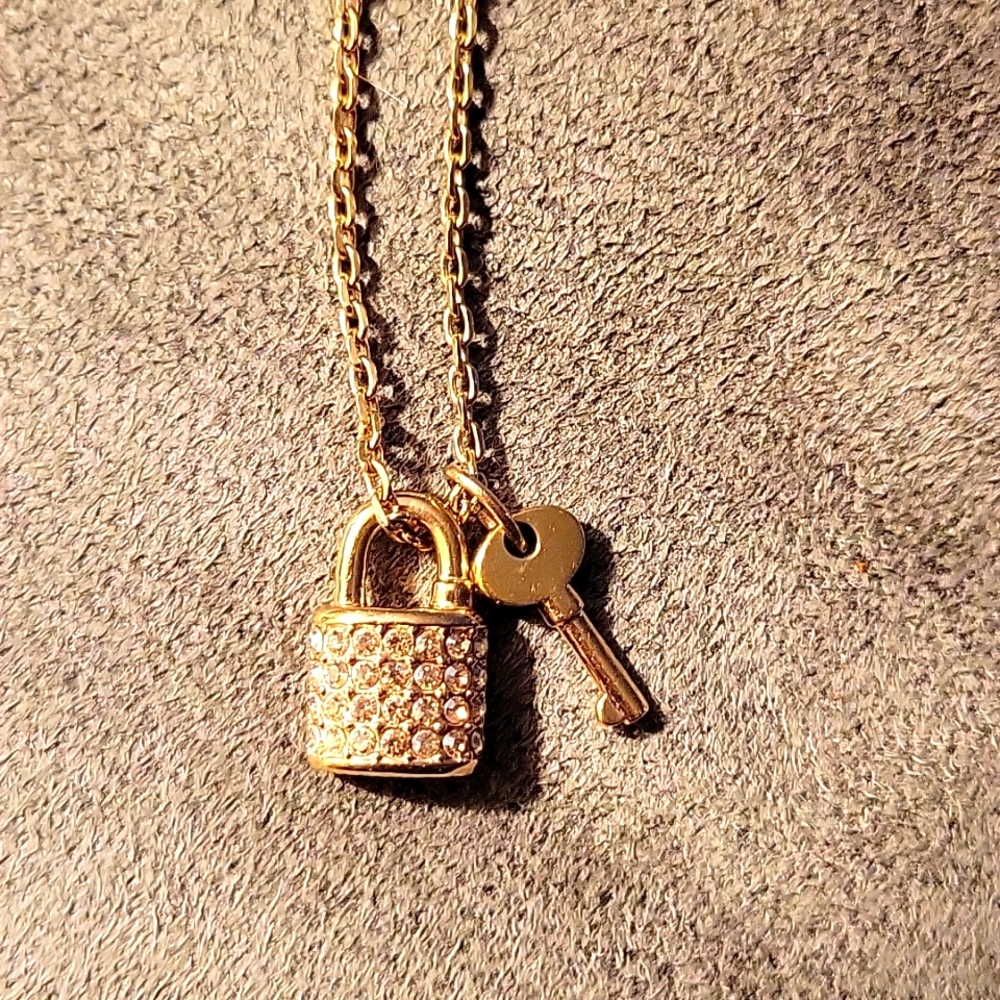 NWOT COACH gold lock and key necklace